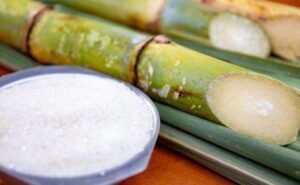 Açúcar sobe em Nova York com colheita lenta no Brasil